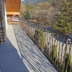 Railing on the balcony of a family house forged in the blacksmithing craftsmanship of UKOVMI Railing on the balcony of a family house forged in the blacksmithing craftsmanship of UKOVMI