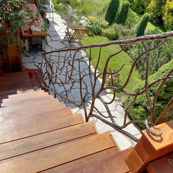 Design railing for stairs in the exterior of a family cottage – exceptional wrought-iron railings in high quality Design railing for stairs in the exterior of a family cottage – exceptional wrought-iron railings in high quality