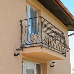 A wrought iron railing - log A wrought iron railing - log