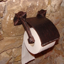 A wrought iron paper roll holder A wrought iron paper roll holder