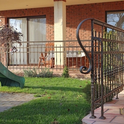 A wrought iron terrace railing A wrought iron terrace railing