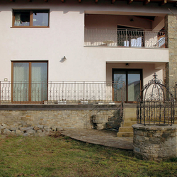 Exterior railings - forged balcony railings on a family house Exterior railings - forged balcony railings on a family house