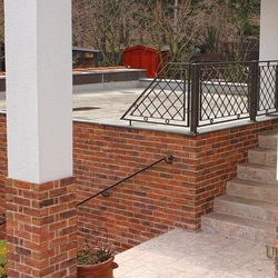 A wrought iron railing A wrought iron railing