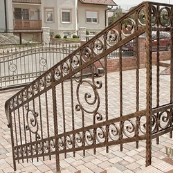 A wrought iron railing A wrought iron railing