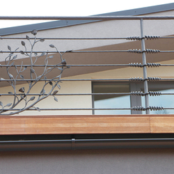 A modern wrought iron railing A modern wrought iron railing