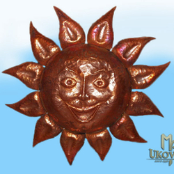 A copper wrought sun A copper wrought sun