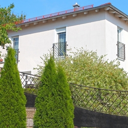 Wrought-iron French balcony railings of a family house in Germany and wrought-iron fencing made in UKOVMI Wrought-iron French balcony railings of a family house in Germany and wrought-iron fencing made in UKOVMI