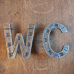 Forged WC sign Forged WC sign