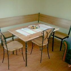 Corner dining bench, table and chairs in the apartment of the folk pension Šariš Park - wrought iron furniture Corner dining bench, table and chairs in the apartment of the folk pension Šariš Park - wrought iron furniture
