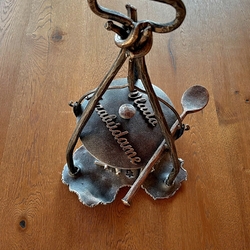 Hand-forged cauldron as a memorial candle holder for a grave Hand-forged cauldron as a memorial candle holder for a grave