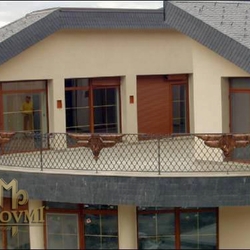 A wrought iron railing - iron and copper combination A wrought iron railing - iron and copper combination